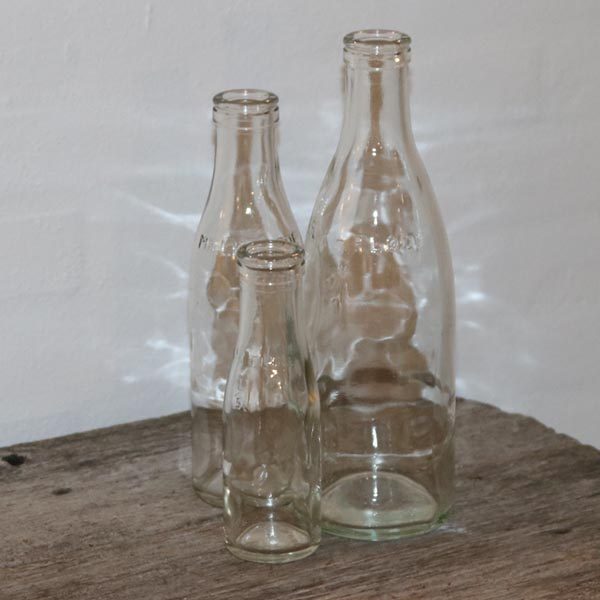 Mælkeflasker 1 liter nedefter i glas